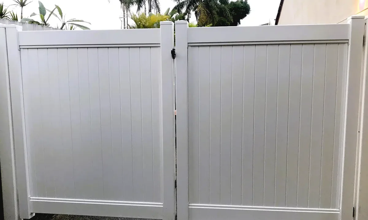 White full privacy PVC gate with matching fence panels